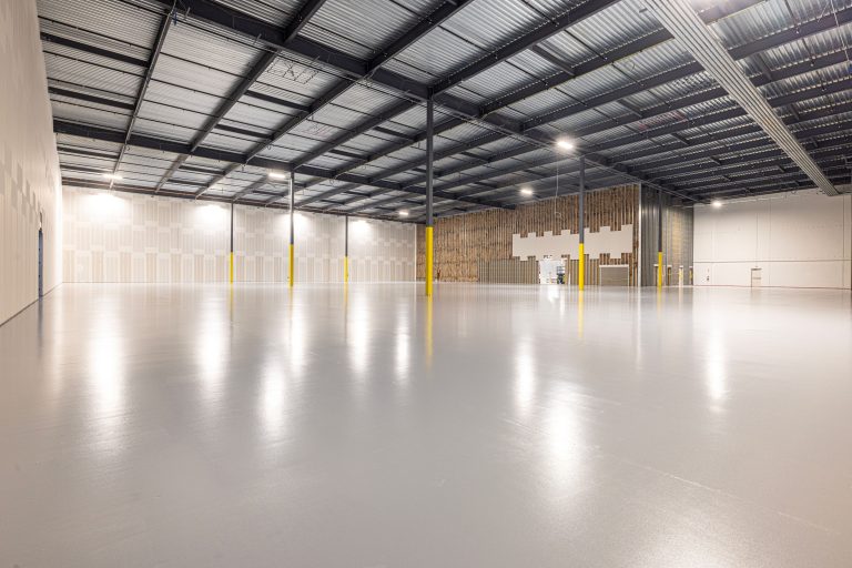 Warehouse floor cleaning on polished concrete in a Texas distribution center